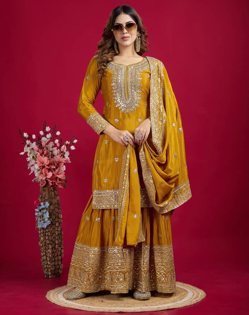Women yellow sequins , zari, coding & thread embroidered work silk kurta set