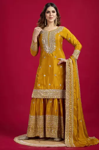 Women yellow sequins  zari coding & thread embroidered work silk kurta set