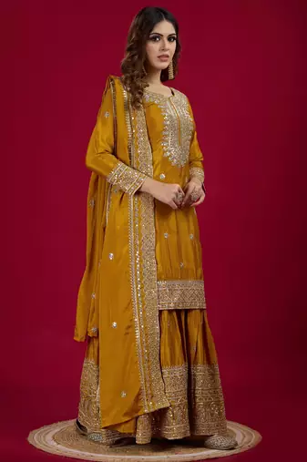 Women yellow sequins  zari coding & thread embroidered work silk kurta set