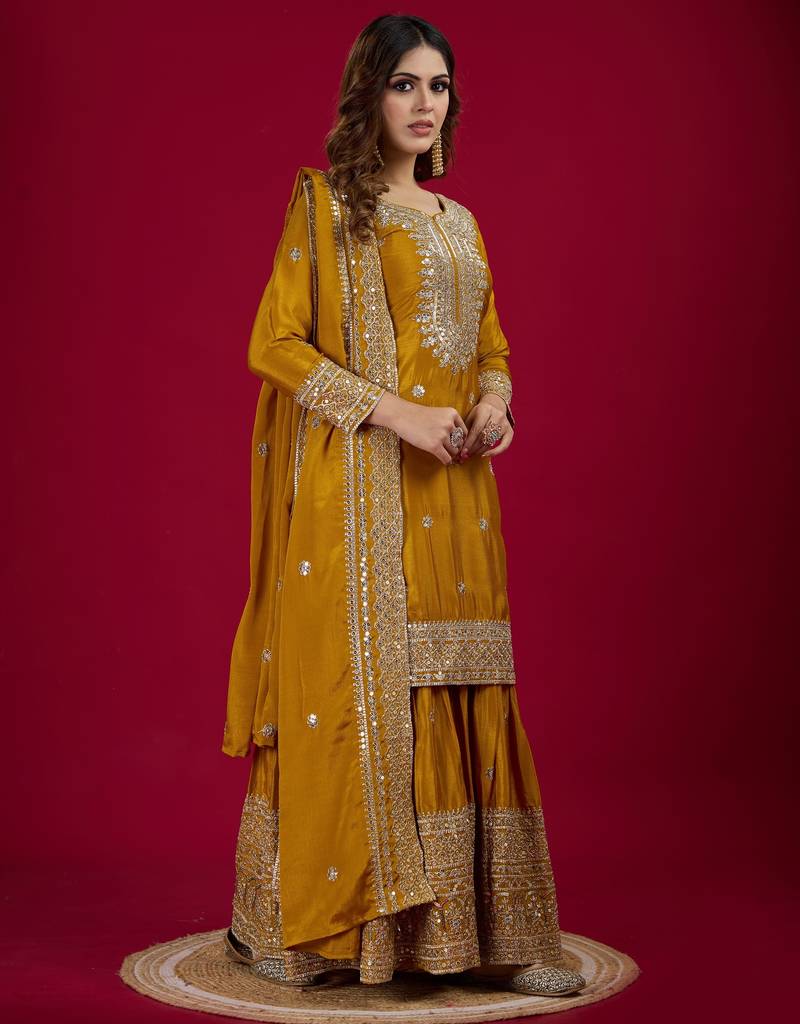 Women yellow sequins , zari, coding & thread embroidered work silk kurta set