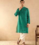 Green embroidered silk kurta set