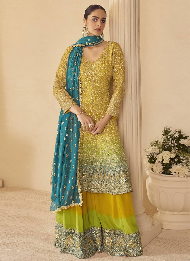Yellow georgette embroidered zarkan work palazzo suit