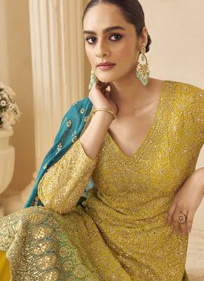 Yellow georgette embroidered zarkan work palazzo suit 2