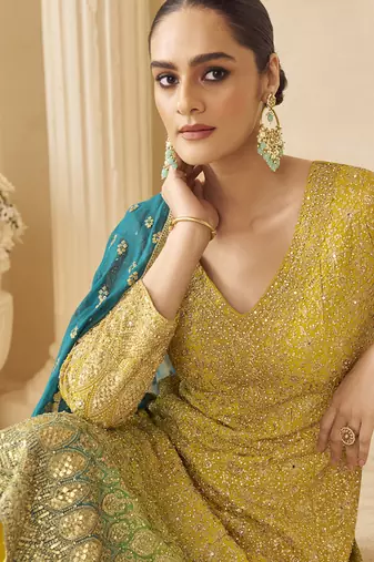 Yellow georgette embroidered zarkan work palazzo suit