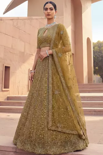 Alluring Green Embroidered Net Engagement Wear Lehenga Choli