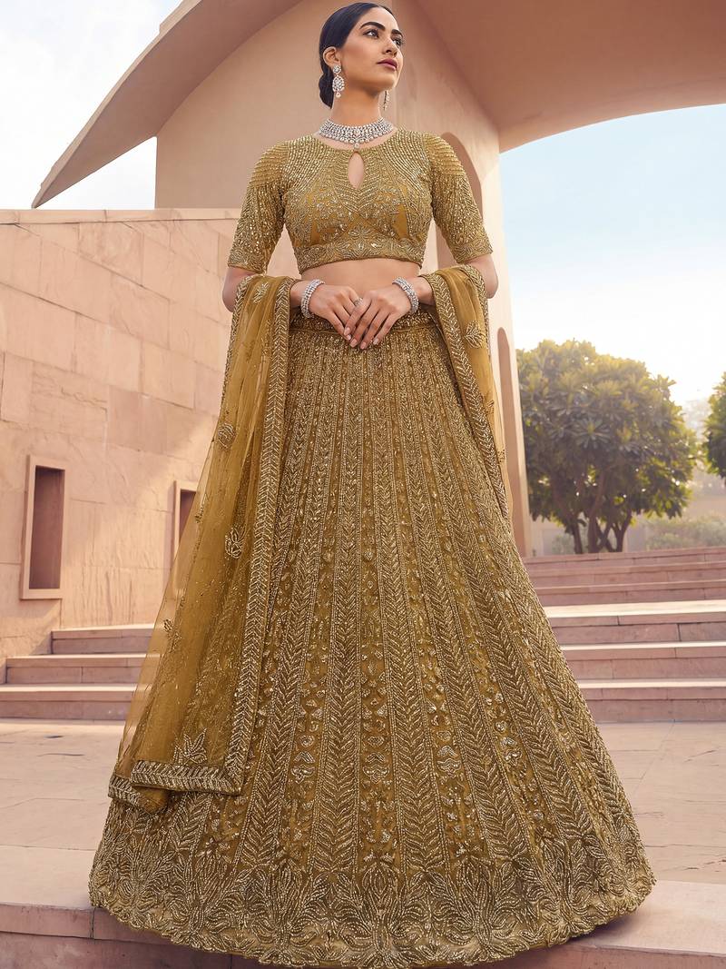 Alluring Green Embroidered Net Engagement Wear Lehenga Choli