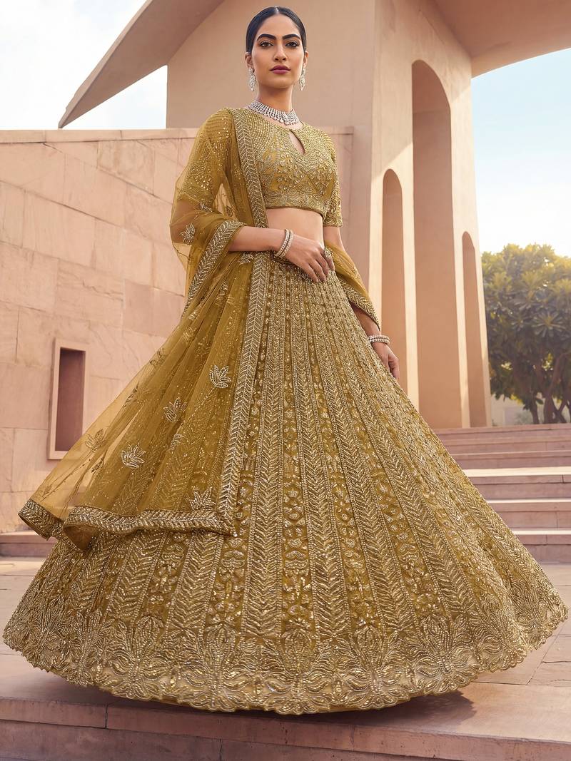 Alluring Green Embroidered Net Engagement Wear Lehenga Choli