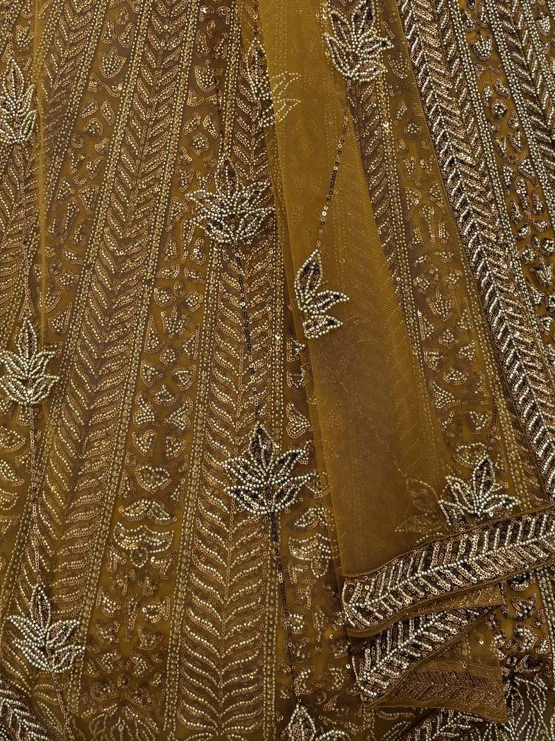 Alluring Green Embroidered Net Engagement Wear Lehenga Choli