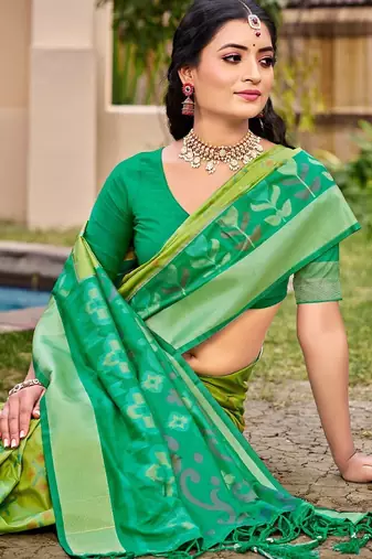 l green silk saree with blouse piece