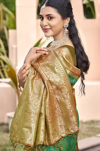 green silk saree with blouse piece