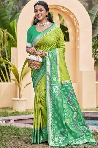 green silk saree with blouse piece
