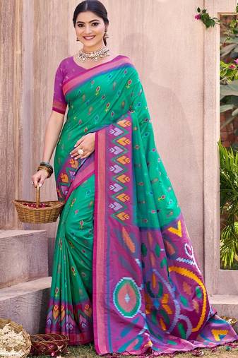 green silk saree with blouse piece