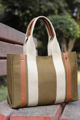 Anekaant sutra soil olive green canvas colorblocked handheld bag