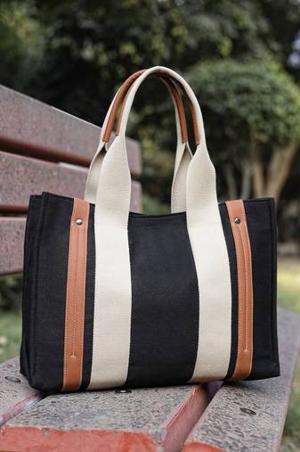 Anekaant sutra soil black canvas colorblocked handheld bag