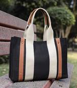 Anekaant sutra soil black canvas colorblocked handheld bag