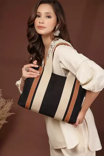 Anekaant sutra soil black canvas colorblocked handheld bag