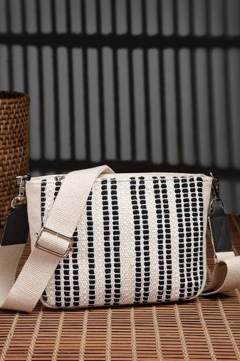 Anekaant earth edit off white & black jacquard striped sling bag