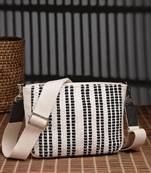 Anekaant earth edit off white & black jacquard striped sling bag