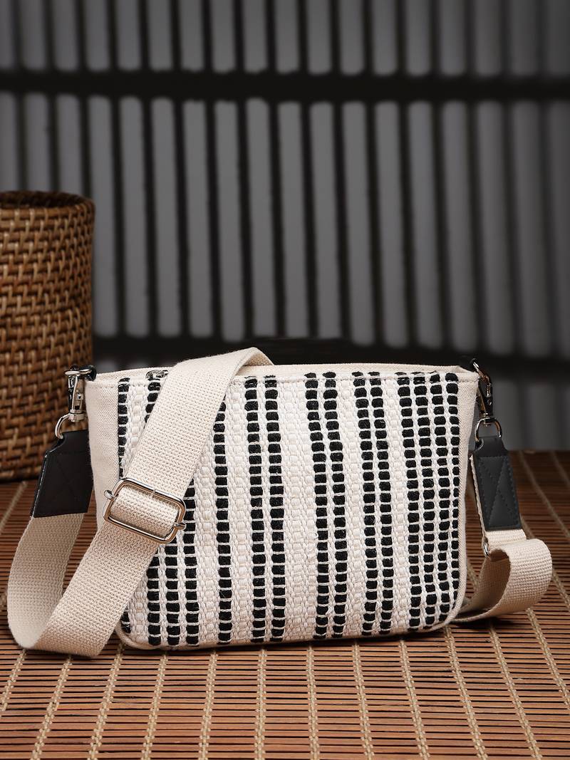 Anekaant earth edit off white & black jacquard striped sling bag