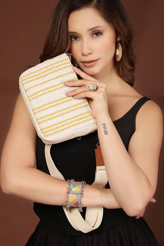 Anekaant earth edit off white & mustard jacquard striped sling bag