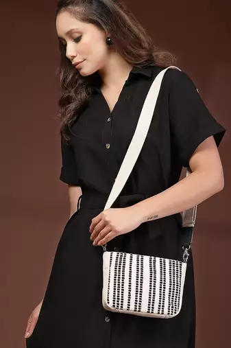Anekaant earth edit off white & black jacquard striped sling bag