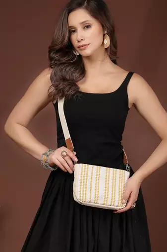 Anekaant earth edit off white & mustard jacquard striped sling bag