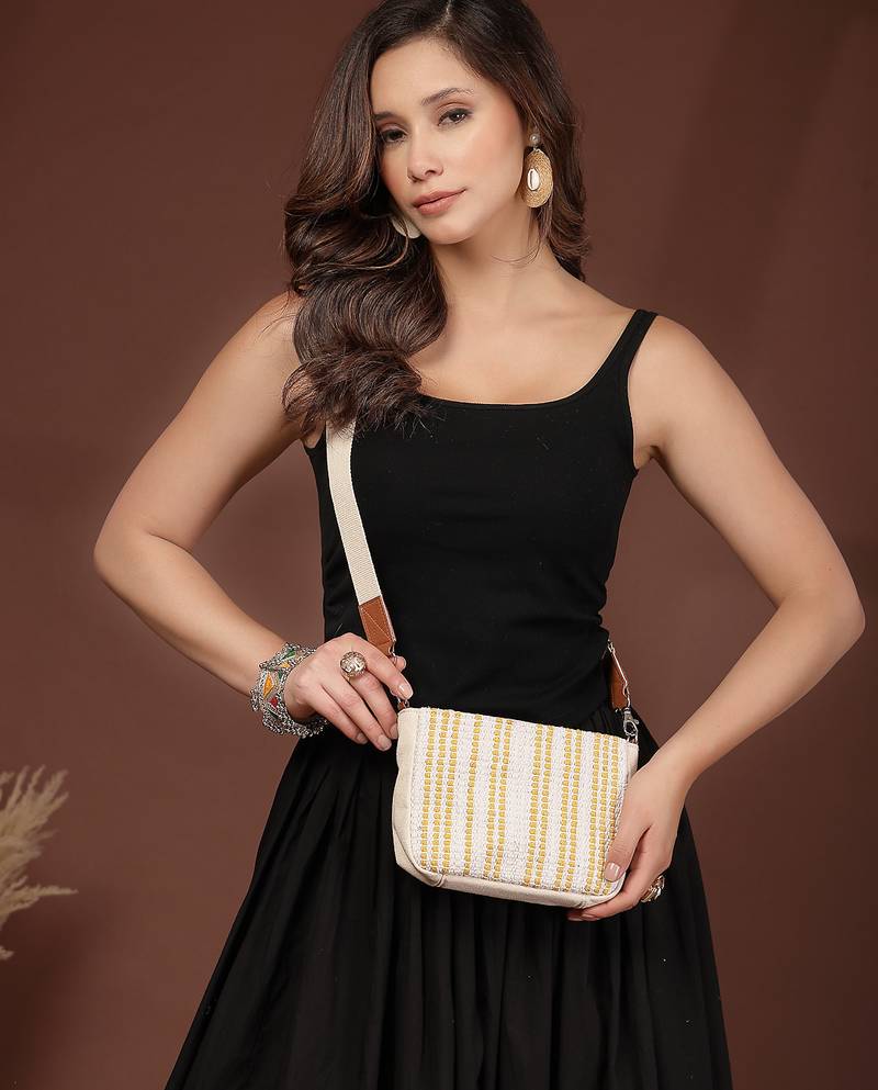 Anekaant earth edit off white & mustard jacquard striped sling bag