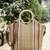 Anekaant earth knots tan jute striped handheld bag
