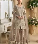 Beige color net embroidered palazzo suit 