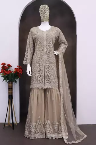 Beige color net embroidered palazzo suit 