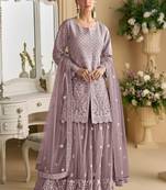 Mauve color net embroidered palazzo suit 