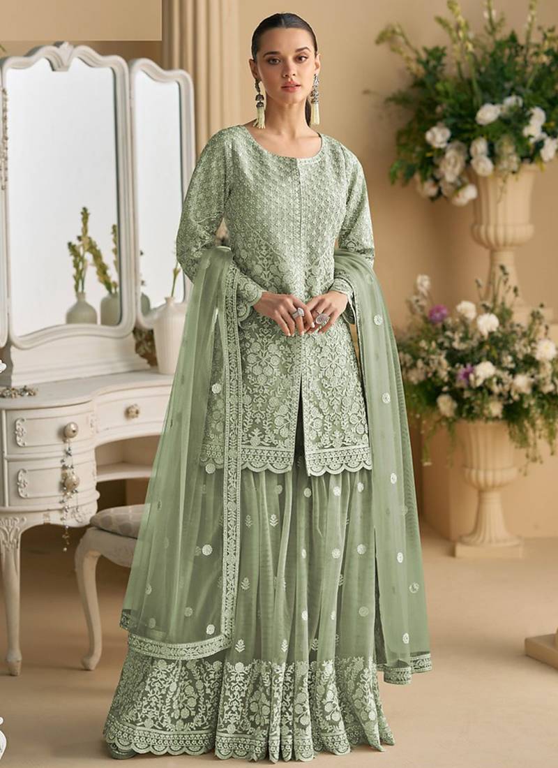 Light green color net embroidered palazzo suit 