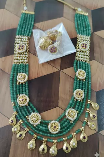 Traditional handcrafted green beaded gold-plated ethnic necklace set with jhumka earrings