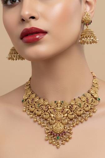 Traditional handcrafted gold-plated temple necklace set with jhumka earrings | ethnic bridal jewelry