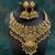 Traditional handcrafted gold-plated temple necklace set with jhumka earrings | ethnic bridal jewelry