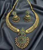 Handcrafted antique gold plated ethnic necklace set with emerald green stones & jhumkas -traditional indian wedding wear