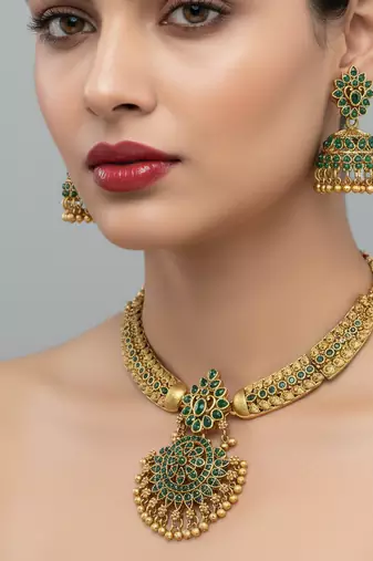Handcrafted antique gold plated ethnic necklace set with emerald green stones & jhumkas -traditional indian wedding wear