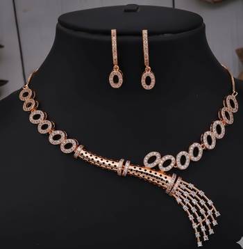Traditional handcrafted rose gold-plated cz necklace set with oval motifs & tassel design 1