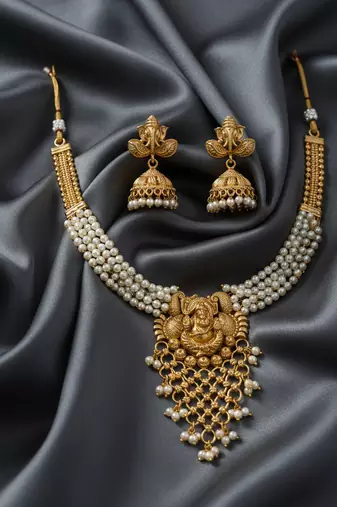 Traditional gold-plated lord ganesha pearl choker necklace set with jhumka earrings – handcrafted ethnic bridal jewelry