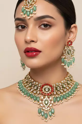 Elegant kundan & meenakari choker set - traditional green & red bridal jewelry with maang tikka