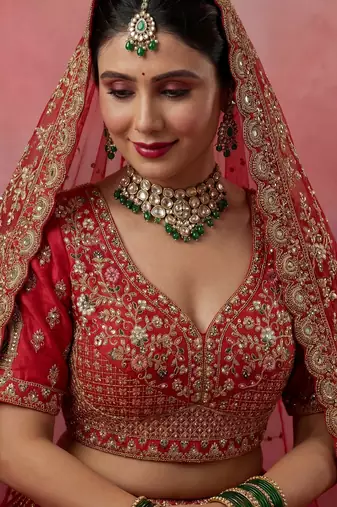 red embroidered silk bridal lehenga choli with double dupatta