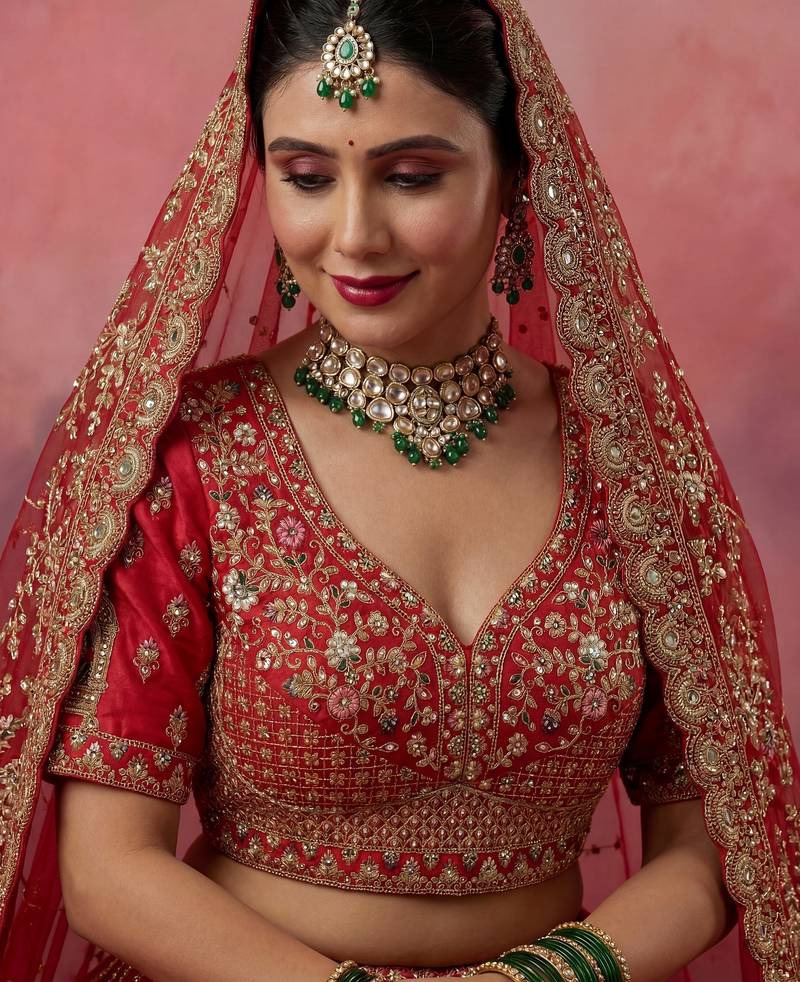red embroidered silk bridal lehenga choli with double dupatta