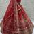 red embroidered silk bridal lehenga choli with double dupatta