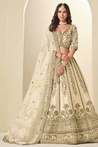 cream embroidered art silk lehenga choli with net dupatta
