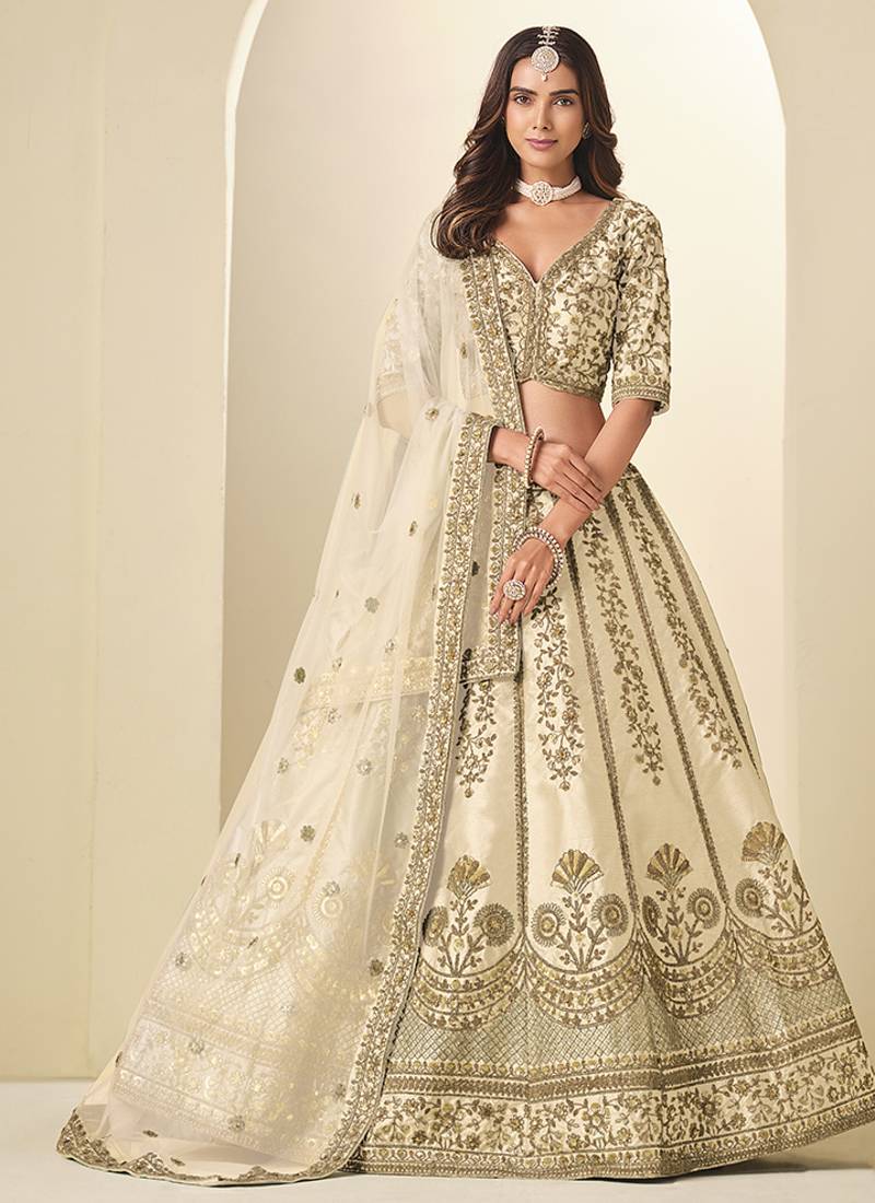 cream embroidered art silk lehenga choli with net dupatta