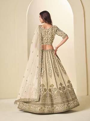 cream embroidered art silk blend lehenga choli with net dupatta 3