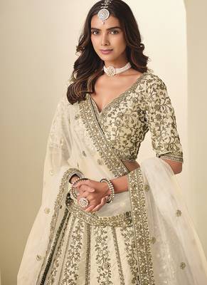 cream embroidered art silk blend lehenga choli with net dupatta 4