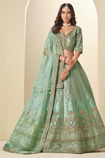 green embroidered art silk lehenga choli with matching dupatta