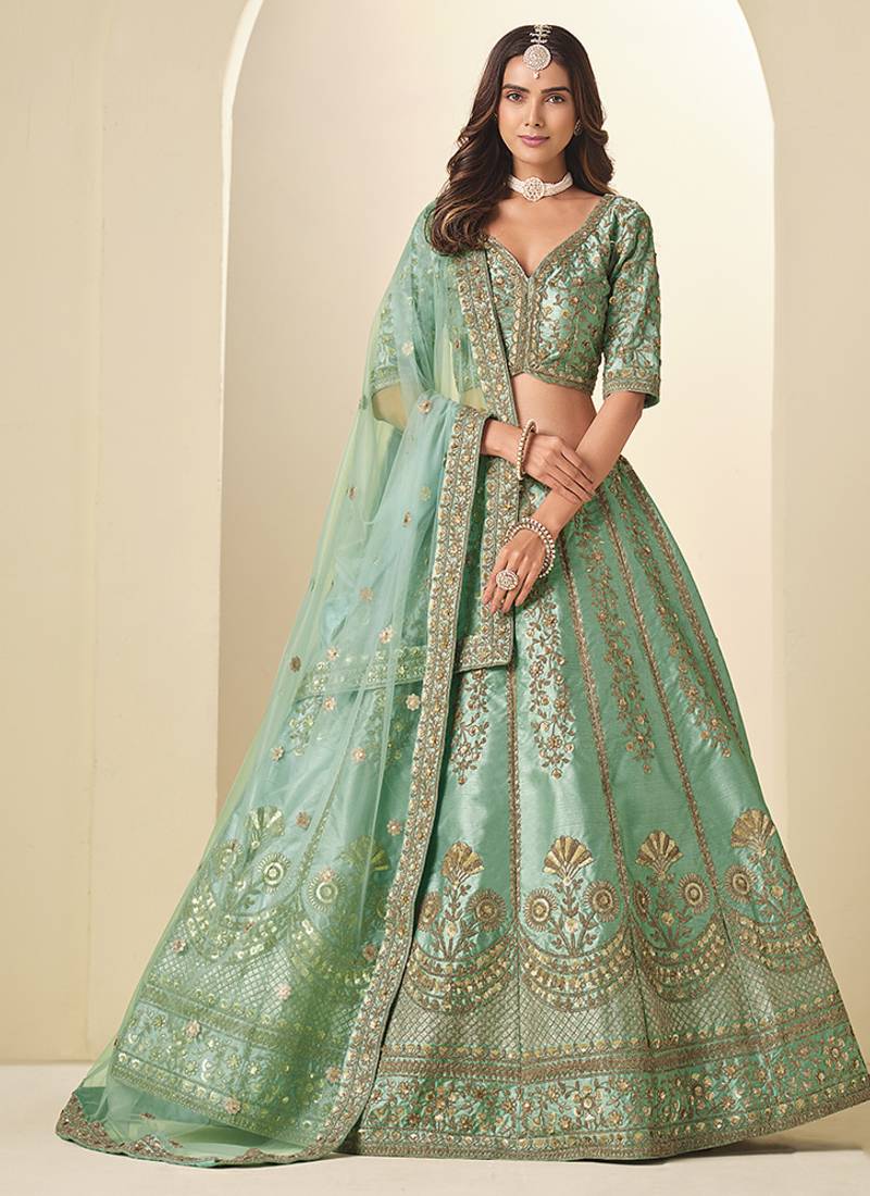 green embroidered art silk lehenga choli with matching dupatta