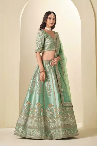 green embroidered art silk blend lehenga choli with matching dupatta